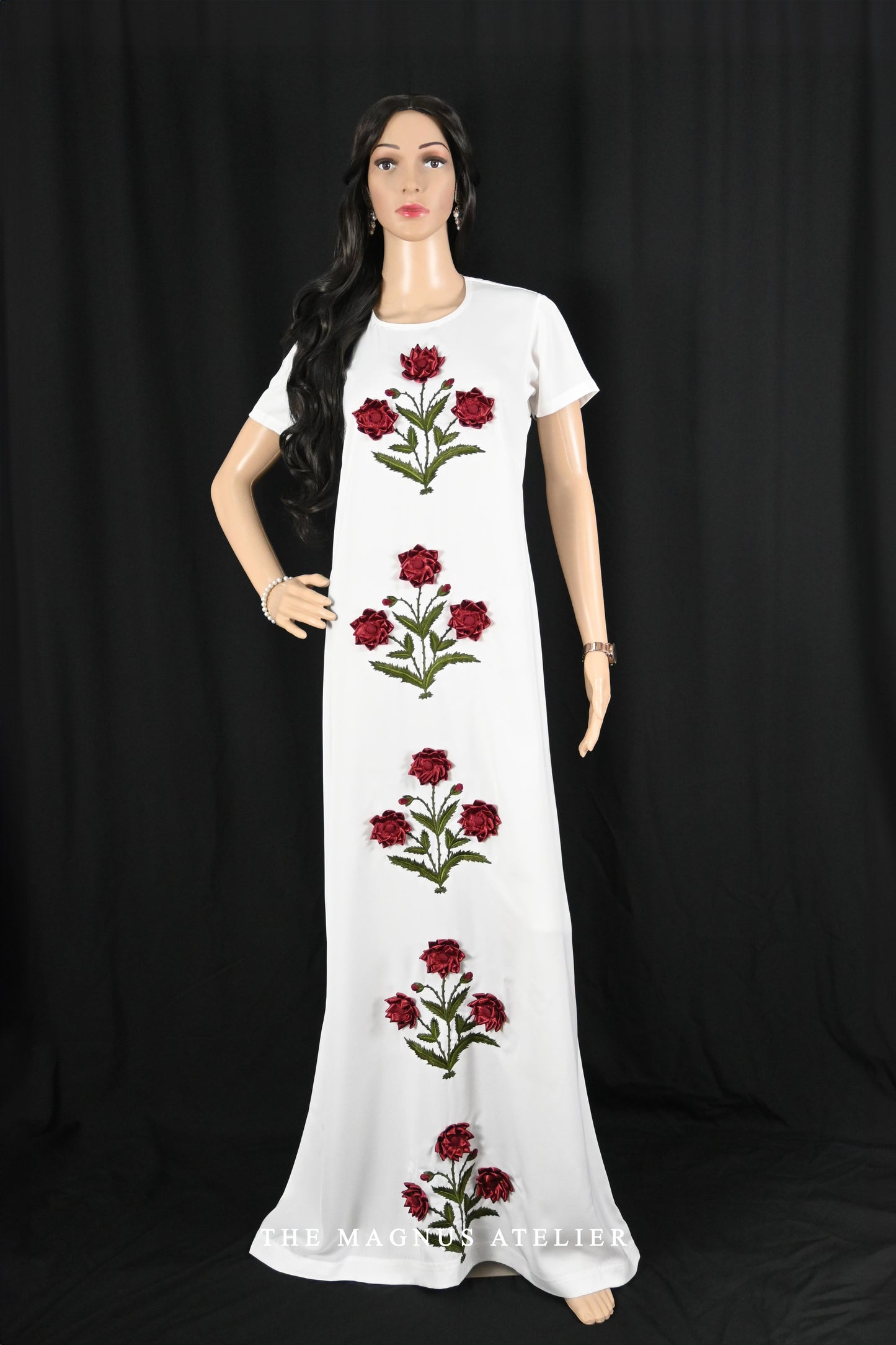 Floor-length white dress with red embroidered roses