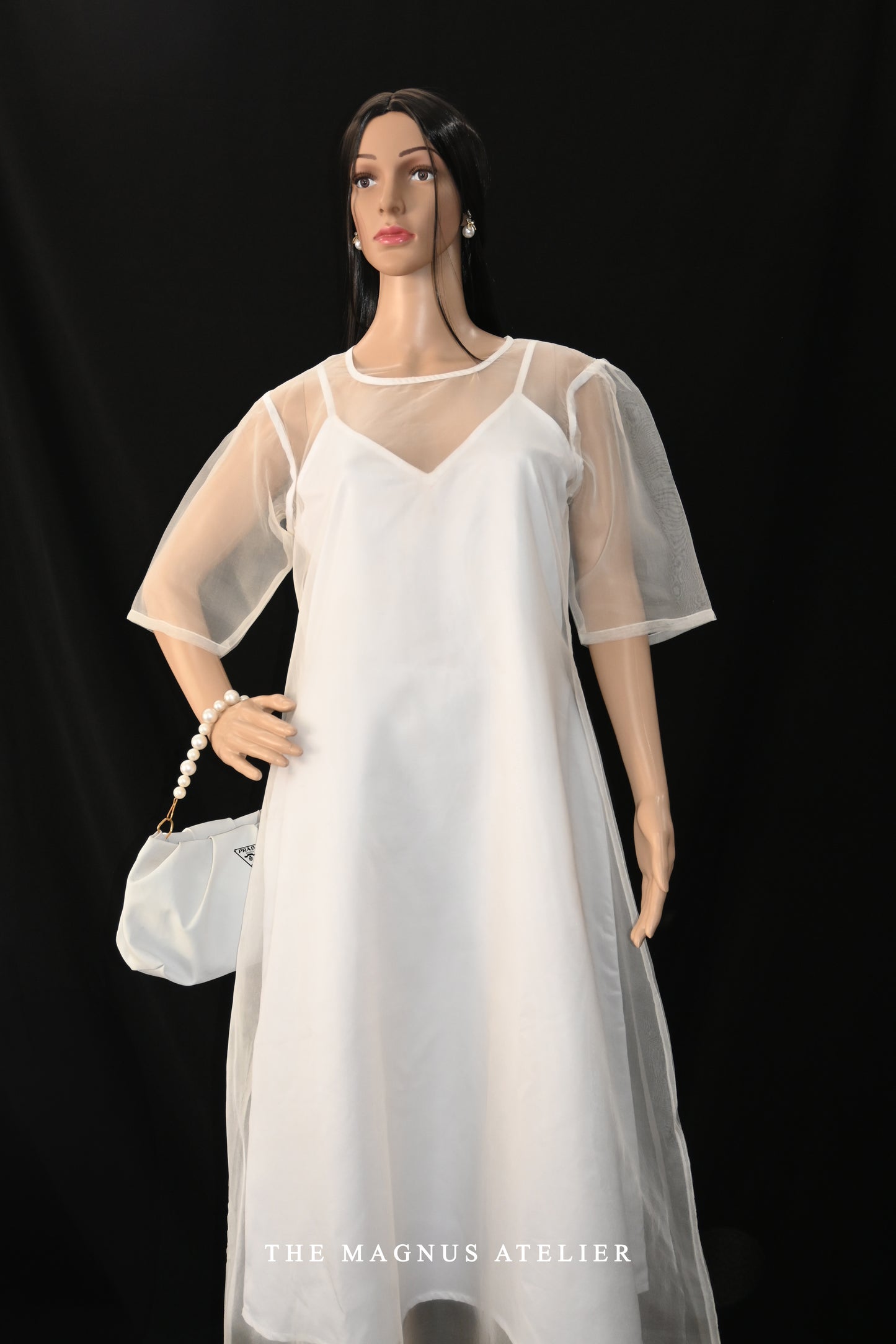 Front view of white organza midi dress