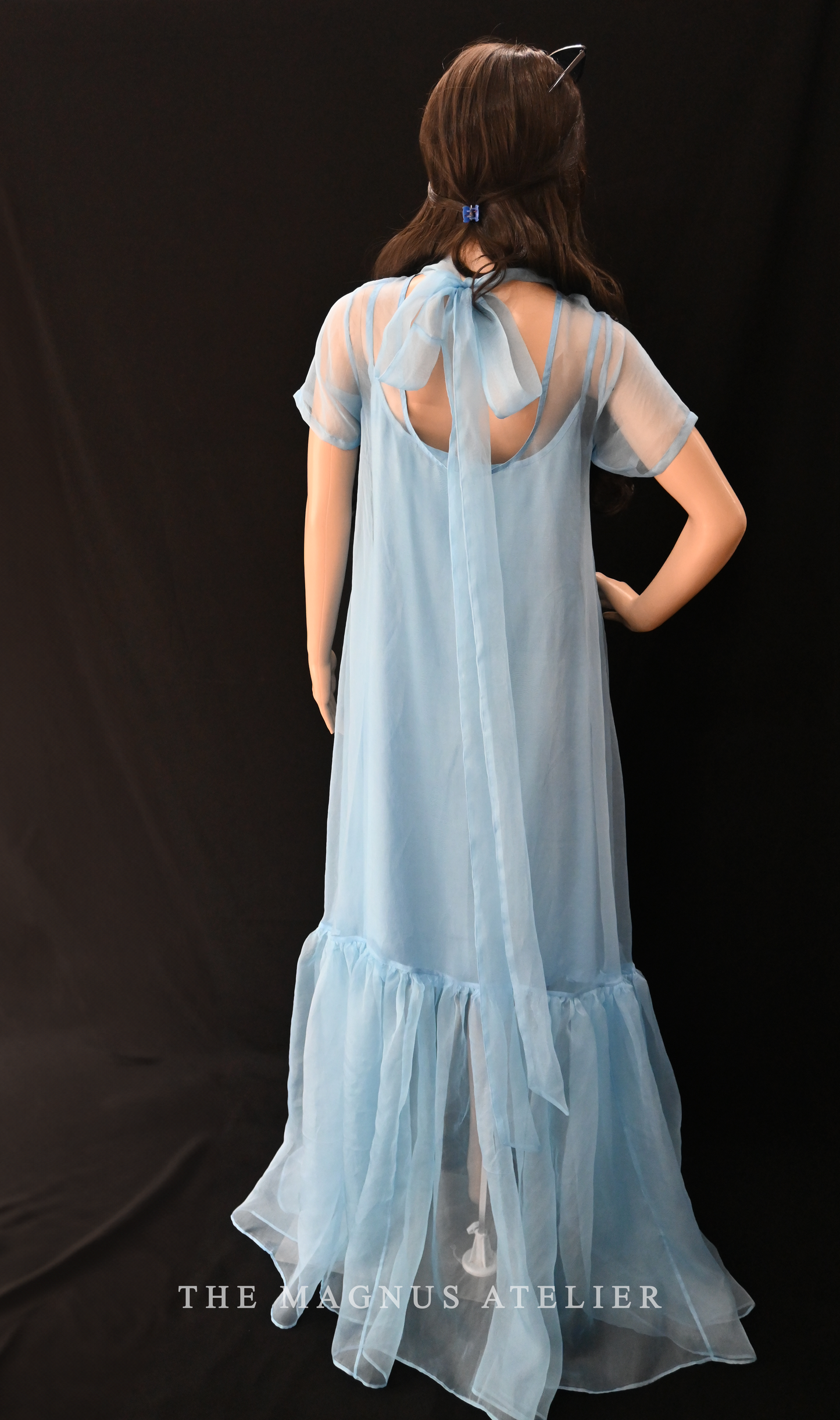 Organza dress with ruffled hem and bow back neck design by The Magnus Atelier