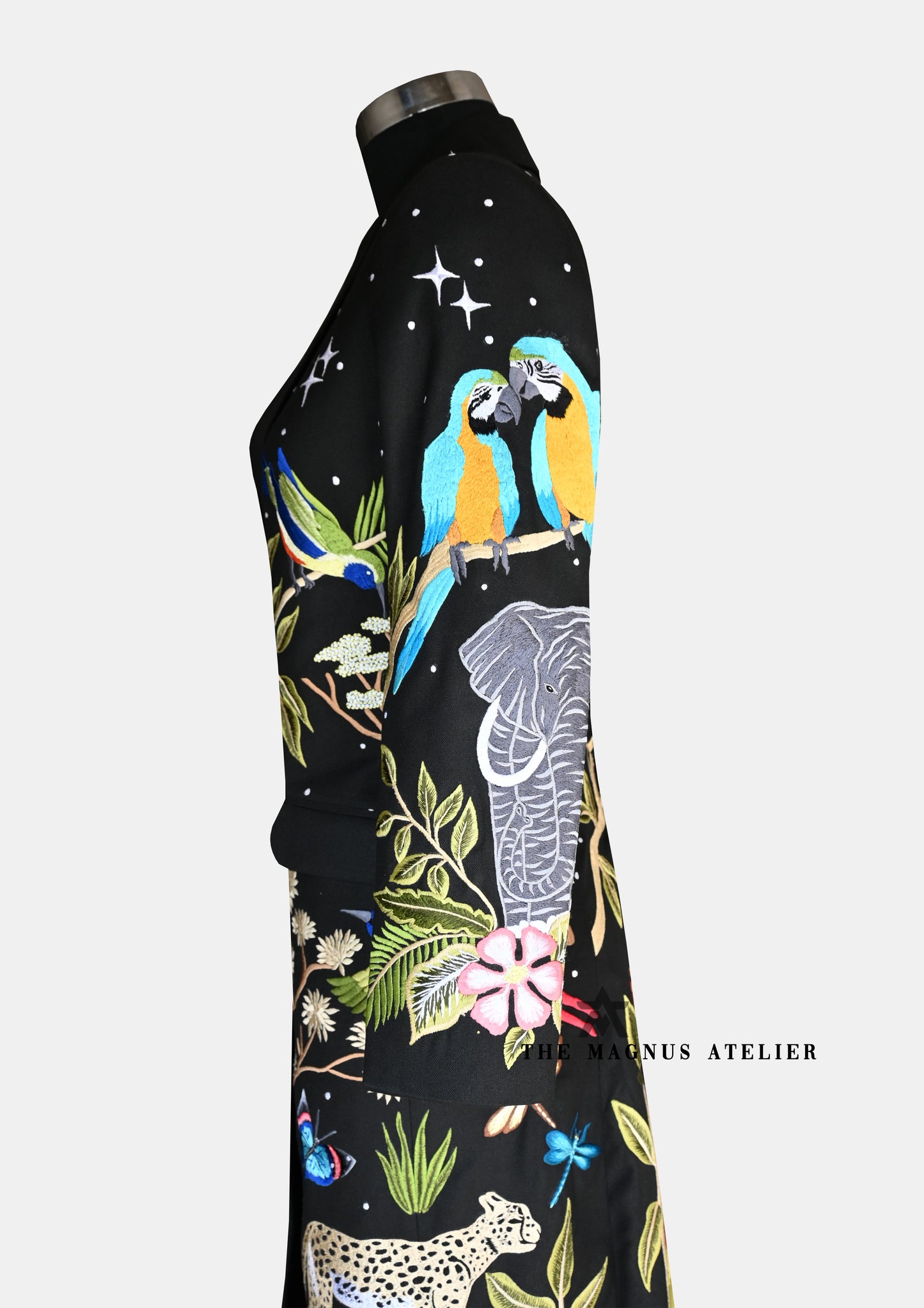 black long coat side view of embroidered coat