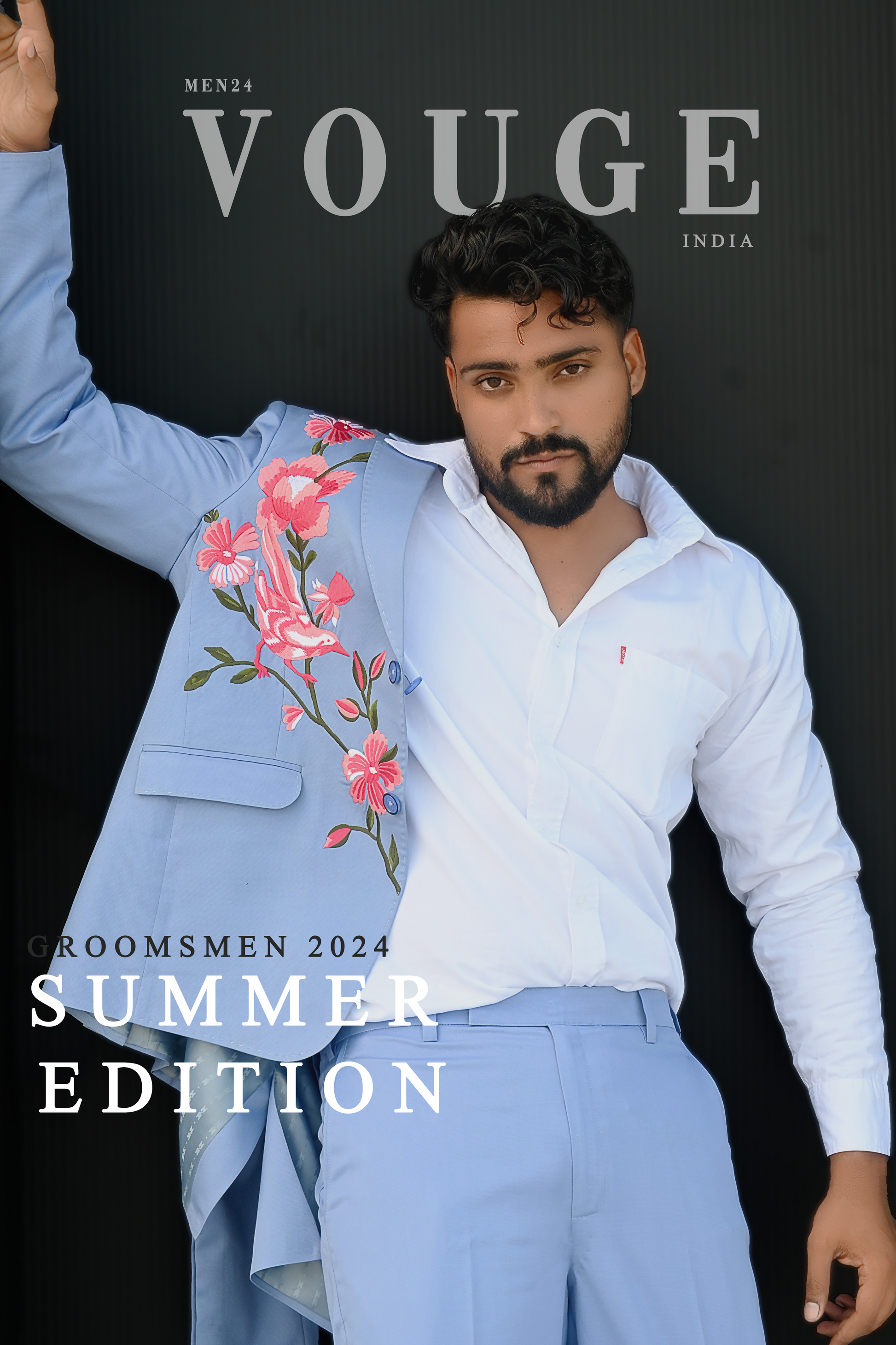 male model wearing embroidered suit for a cover shoot