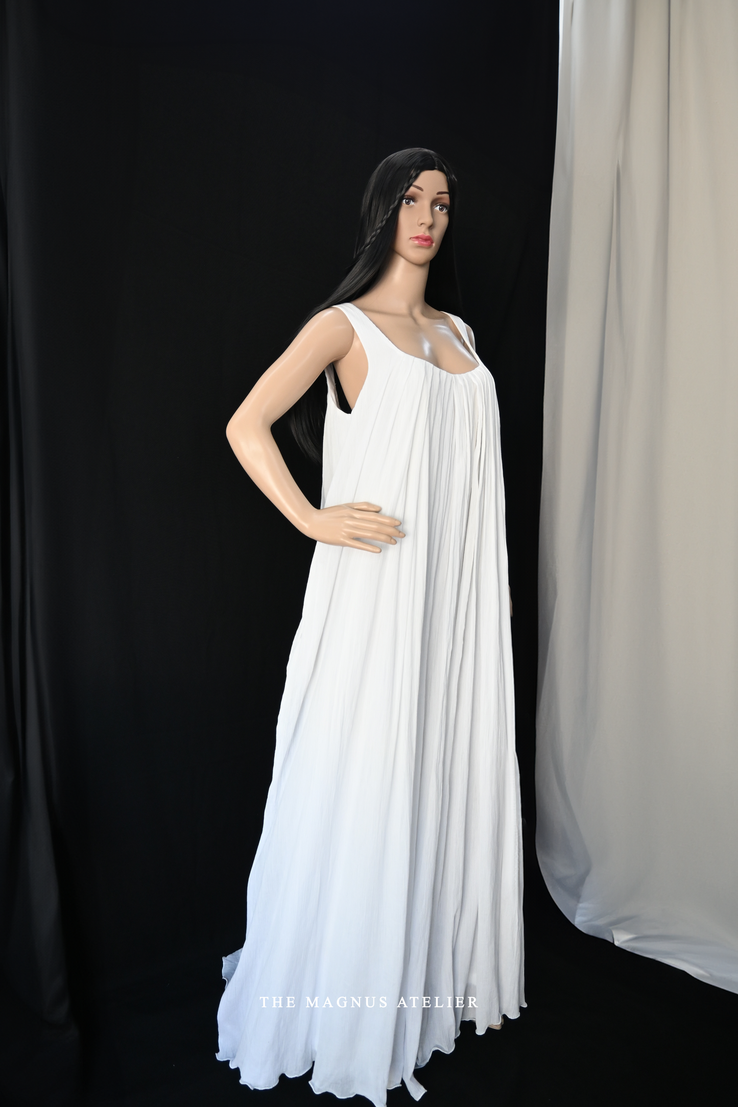 Full-length view of women's designer wrinkle cotton maxi dress in white 

